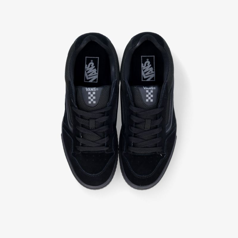 Schwarze Sneaker mit Schnürsenkeln und gepolsterter Zunge in moderner, robuster Ausführung, Draufsicht