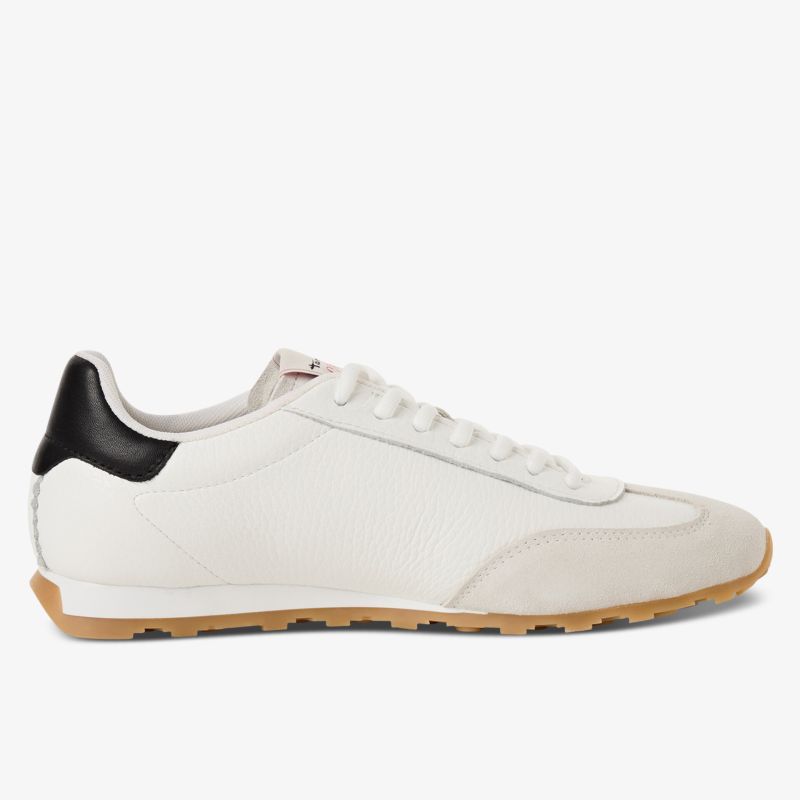 Moderner weißer Sneaker mit schwarzer Ferse, schlankem Design und leichter, flexible Sohle für komfortablen Tragekomfort