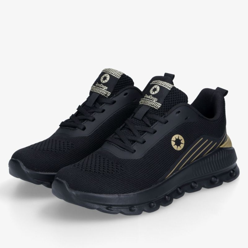 Sportliche schwarze Schuhe mit gepolstertem Einstieg und rutschfester Sohle, leicht und komfortabel für Alltag und Sport