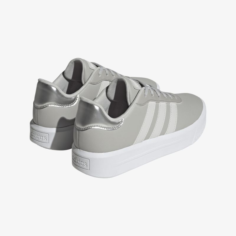 Graue Sneaker mit weißer Sohle und ikonischen Streifen. Komfortabel und für jeden Anlass geeignet.