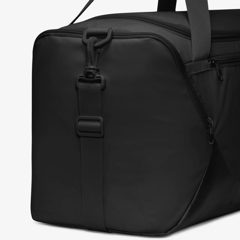 Robuste graue Reisetasche mit stabilem Griff und seitlichem Reißverschluss, ideal für Reisen und Sport