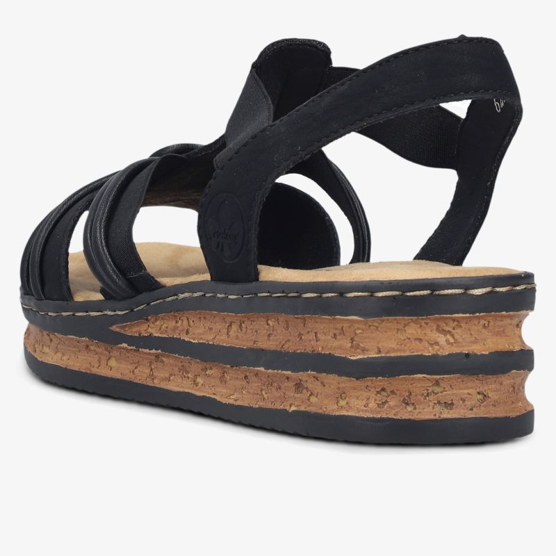 Schwarze Sandale mit leichtem Kork-Keilabsatz und verstellbarem Riemen, bequem und stylish