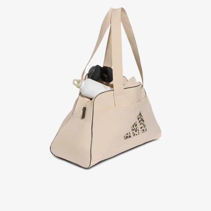 Geräumige beige Tasche mit verstellbarem Tragegurt und praktischem Reißverschlussfach für den modernen Alltag