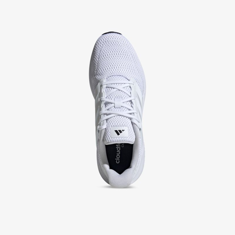 Leichter weißer Sportschuh mit atmungsaktivem Obermaterial, flexibler Schnürung und stoßdämpfender Sohle, Ansicht von oben.