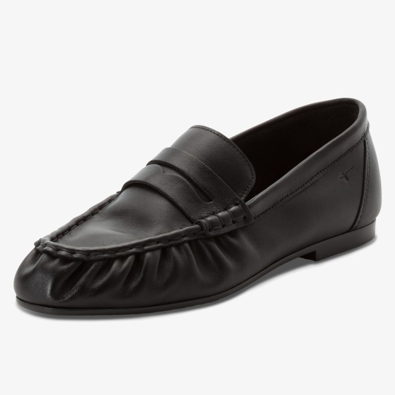 Schwarzer Lederslipper mit feinen Falten, flachem Absatz und elegantem Design für komfortablen Alltag