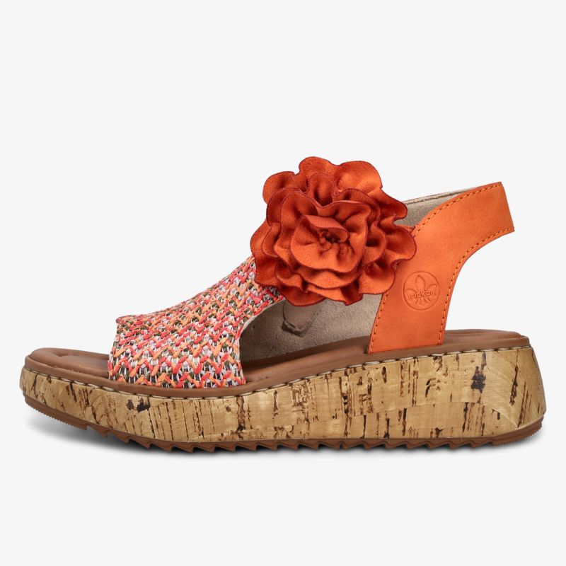 Bequeme Sandale mit Kork-Plateau und großer dekorativer Blumenapplikation in warmem Orange
