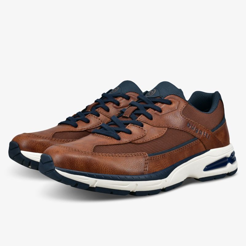 Modische braune Sneaker mit sportlichem Design und robuster Sohle. Perfekt für einen bequemen Laufkomfort.