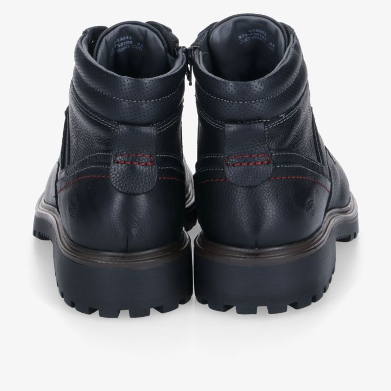 Robuste schwarze Boots mit komfortabler Passform und strapazierfähiger rutschfester Sohle. Ideal für jedes Wetter.