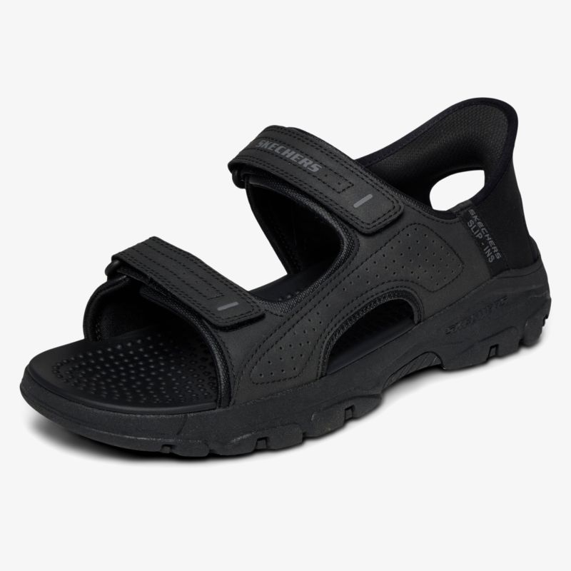 Bequeme schwarze Sandale mit verstellbaren Klettverschlüssen und rutschfester Profilsohle für optimalen Halt