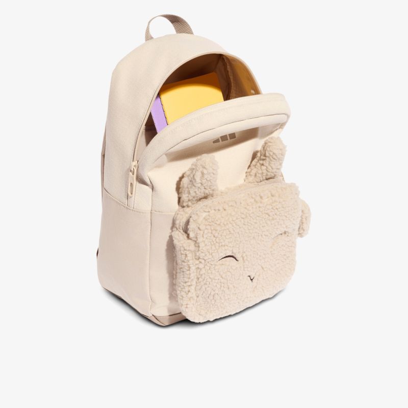 Kuscheliger Rucksack mit weichem Plüsch-Frontfach und niedlichem Gesicht in cremefarbenem Design