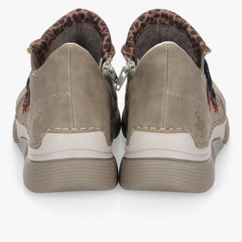 Beige Sneaker Rückansicht mit gepolstertem Schaft, weichem Innenfutter und praktischem Reißverschluss für einfachen Einstieg