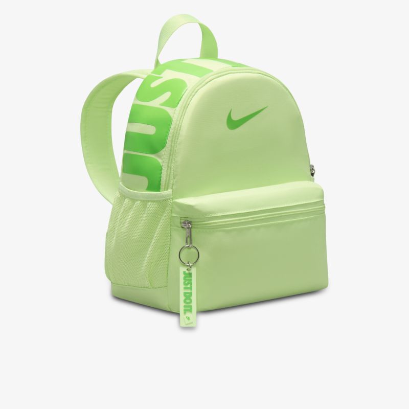 Kompakter Rucksack in leuchtendem Grün mit modernem Design und praktischer Vorderfronttasche.