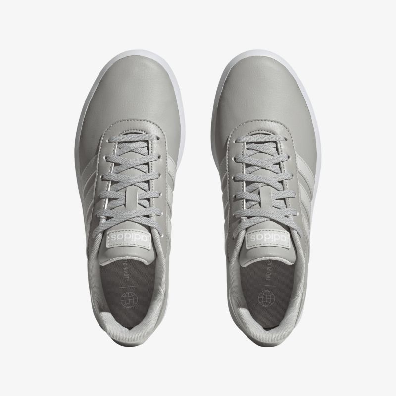 Graue, stilvolle Sneaker mit Schnürung, ideal für Alltag und sportliche Aktivitäten. Robuste Sohle für Komfort.