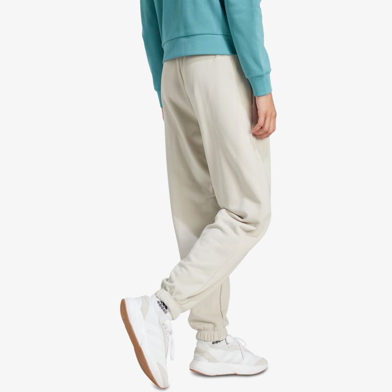Bequeme cremefarbene Jogginghose mit elastischem Bund und Bündchen, perfekt für sportliche und lässige Looks