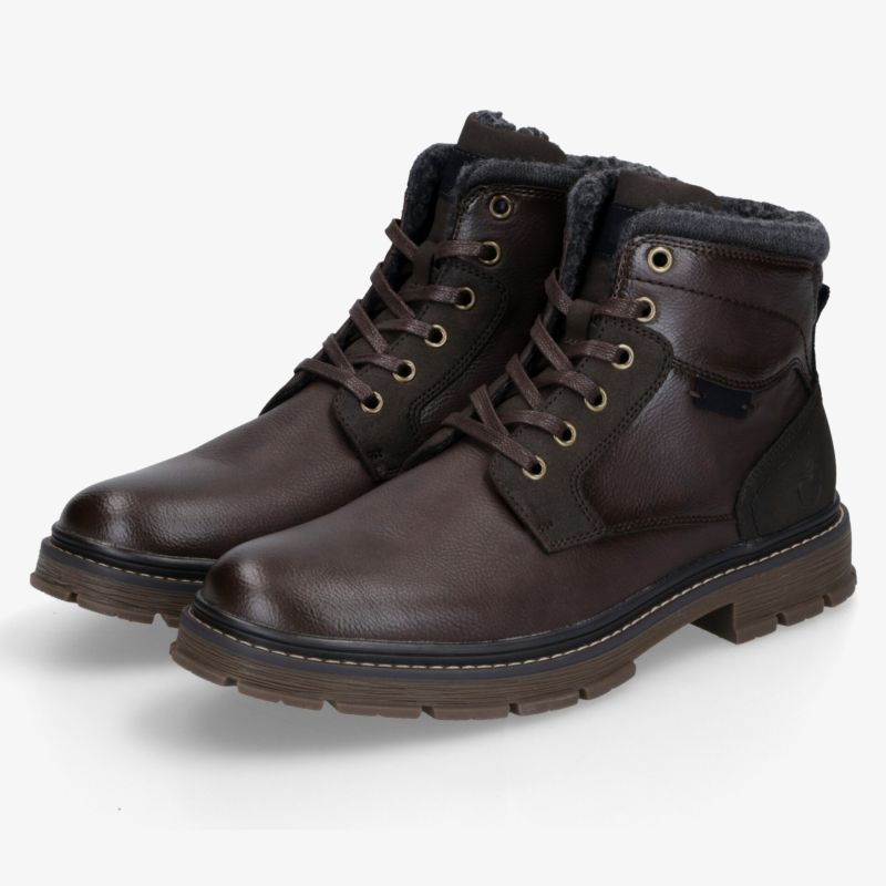 Robuste Lederstiefel mit warmem Futter und strapazierfähiger Sohle für stilvolle Wintertage.