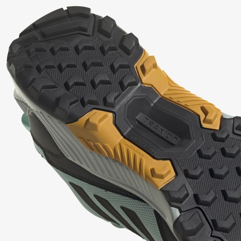 Robuste Laufsohle mit vielseitigem Profil für optimalen Grip und Stabilität auf anspruchsvollem Terrain.