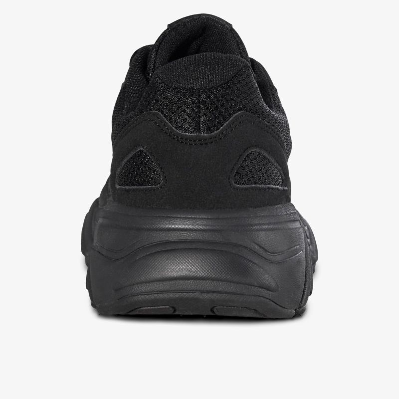 Schwarzer Schuh mit robustem Design und flexibler Sohle in Rückansicht