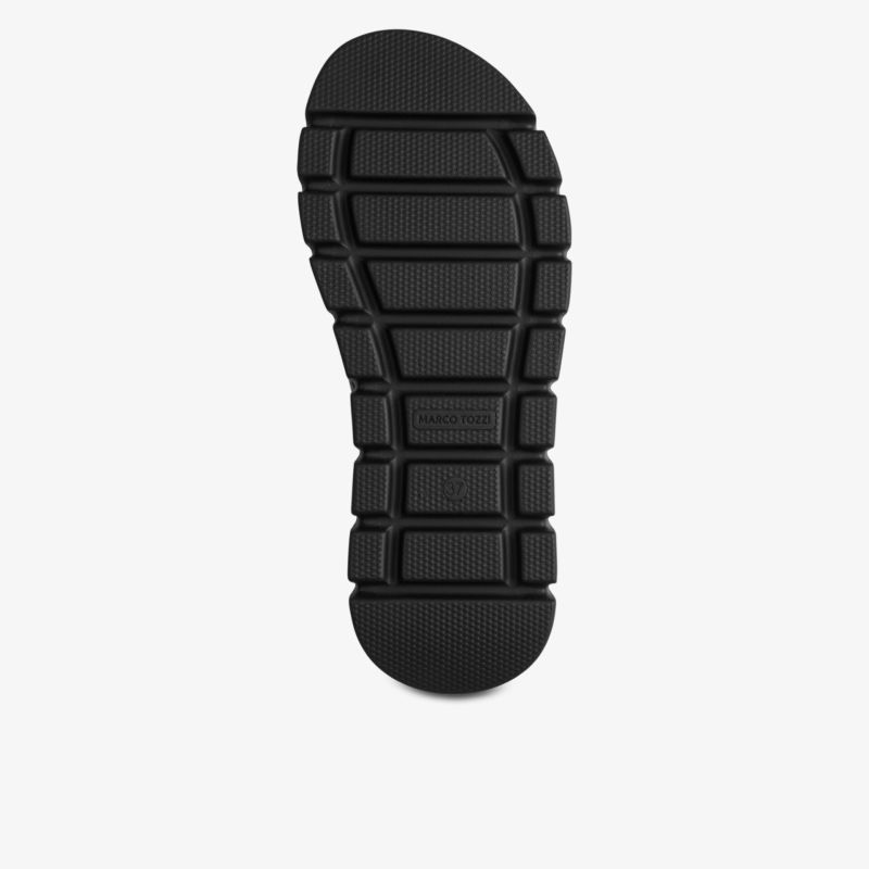 Schwarze rutschfeste Schuhsohle mit flexiblem Profil und robuster Struktur für optimalen Grip