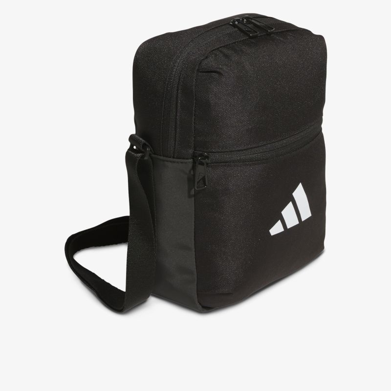 Komfortable kleine schwarze Tasche mit robustem Material, praktischem Reißverschluss und stylischem Logo vorne