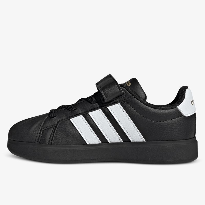 Schwarzer Sneaker mit weißen Streifen in klarer seitlicher Ansicht, robust und sportlich