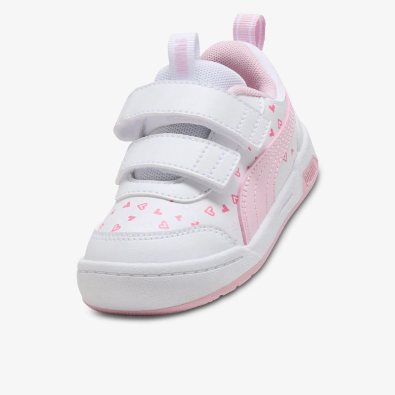 Weiße Kindersneaker mit rosa Herzen und Klettverschlüssen, bequem und leicht für aktive Tage