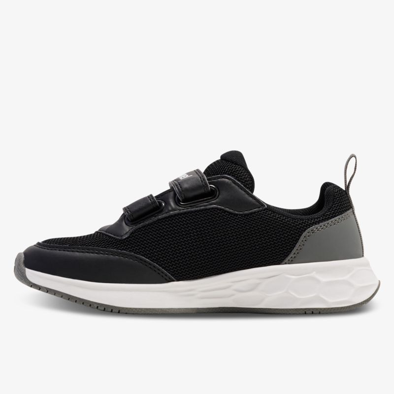 Leichter schwarzer Sneaker mit weißer Sohle und praktischem Klettverschluss, komfortabel und modern