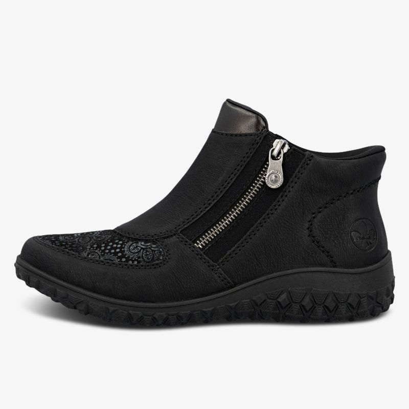 Bequemer schwarzer Schuh mit Reißverschluss und flexibler Sohle für hohen Tragekomfort und modisches Design