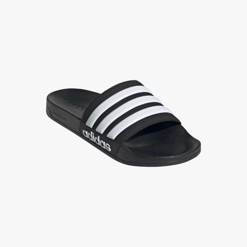 Bequeme, rutschfeste schwarze Sport-Sandale mit markanten weißen Streifen und gepolstertem Fußbett.