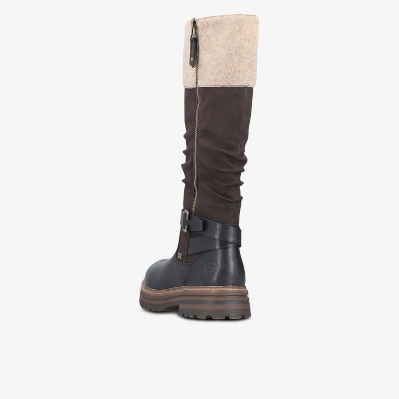 Eleganter Stiefel mit robustem Absatz und gemütlichem Innenfutter in hochwertigem Material in seitlicher Ansicht