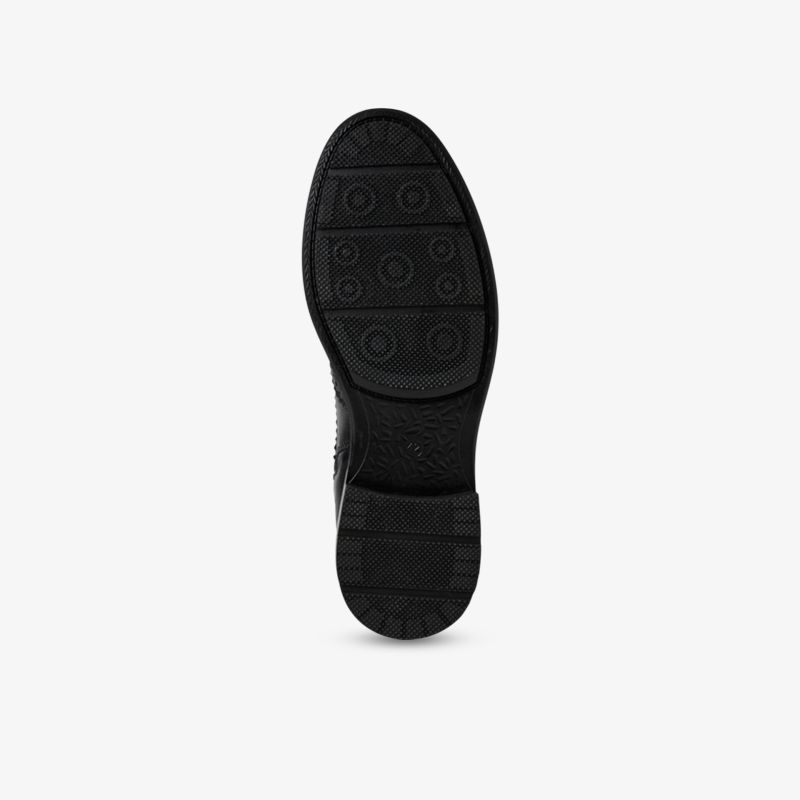 Robuste schwarze Schuhsohle mit rutschfestem Profil für beste Haftung und hohen Tragekomfort