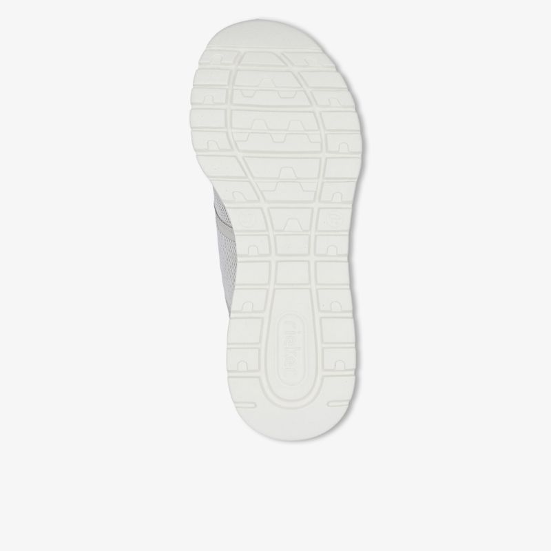 Weiße Schuhsohle mit rutschfestem Profil und flexibler Stoßdämpfung für hohen Laufkomfort
