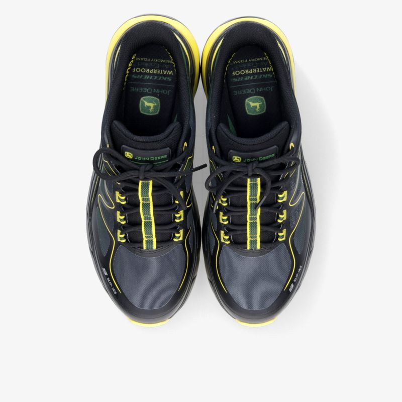 Leichte und atmungsaktive Sportschuhe in Grau mit gelben Akzenten, rutschfeste Sohle und bequeme Passform, Draufsicht
