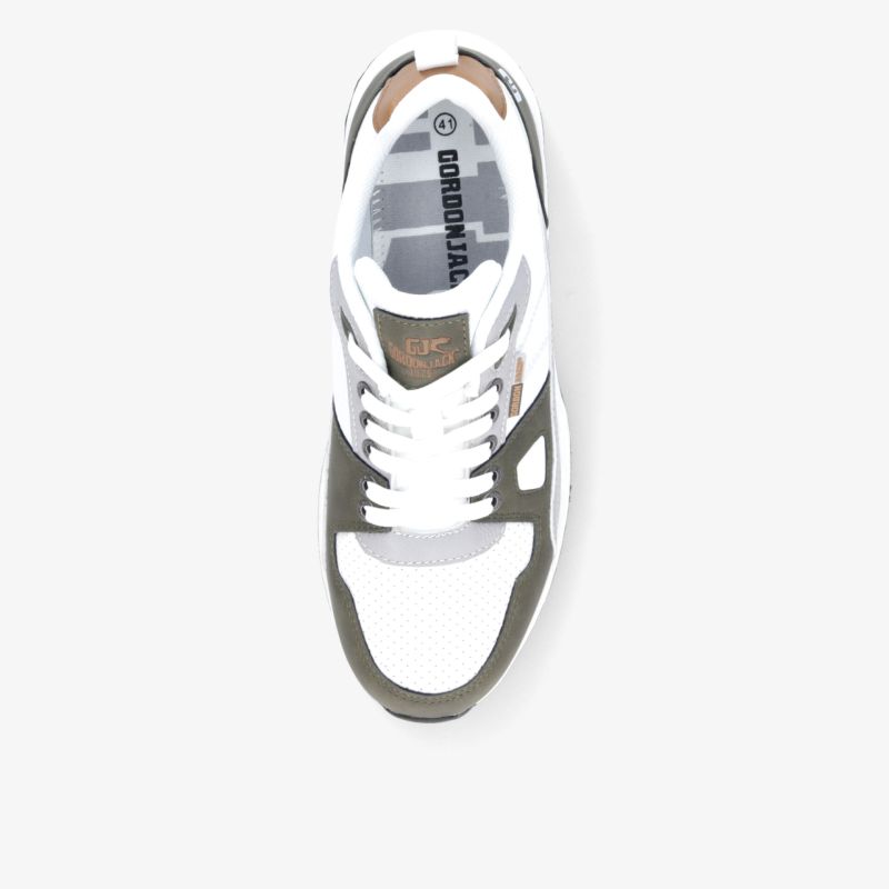 Weißer Sneaker mit grauen Akzenten und bequemer Polsterung, ideal für sportlichen Alltag