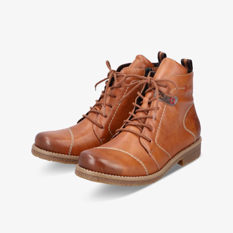 Braune Lederstiefel im Paar mit robuster Sohle und klassischer Schnürung, komfortabel und stilvoll gestaltet