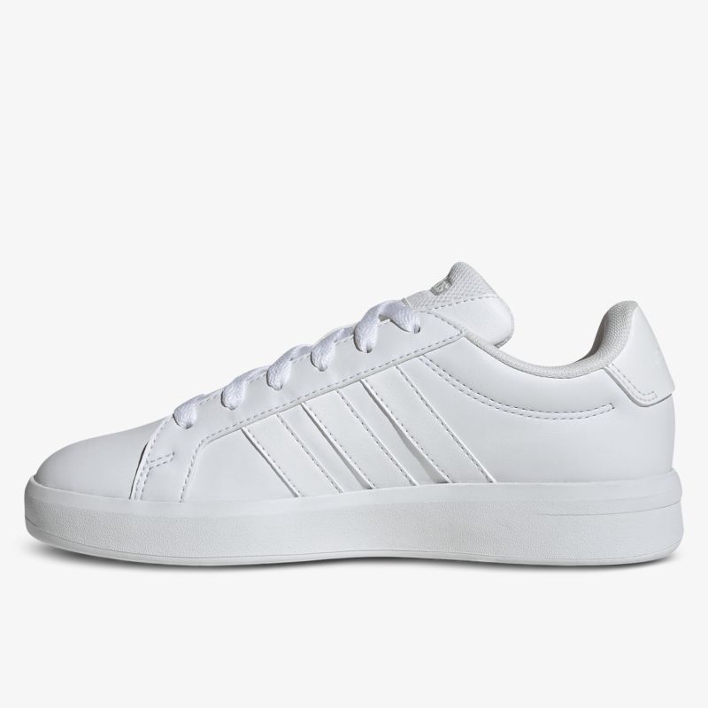 weißer Sneaker mit klassischem Design und bequemer, leichter Sohle, seitliche Ansicht