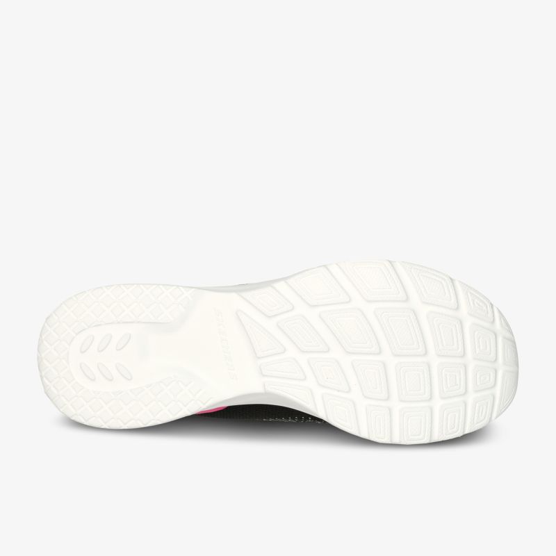 Weiße Schuhsohle mit starkem Profil für optimalen Halt und Komfort bei jeder Bewegung.