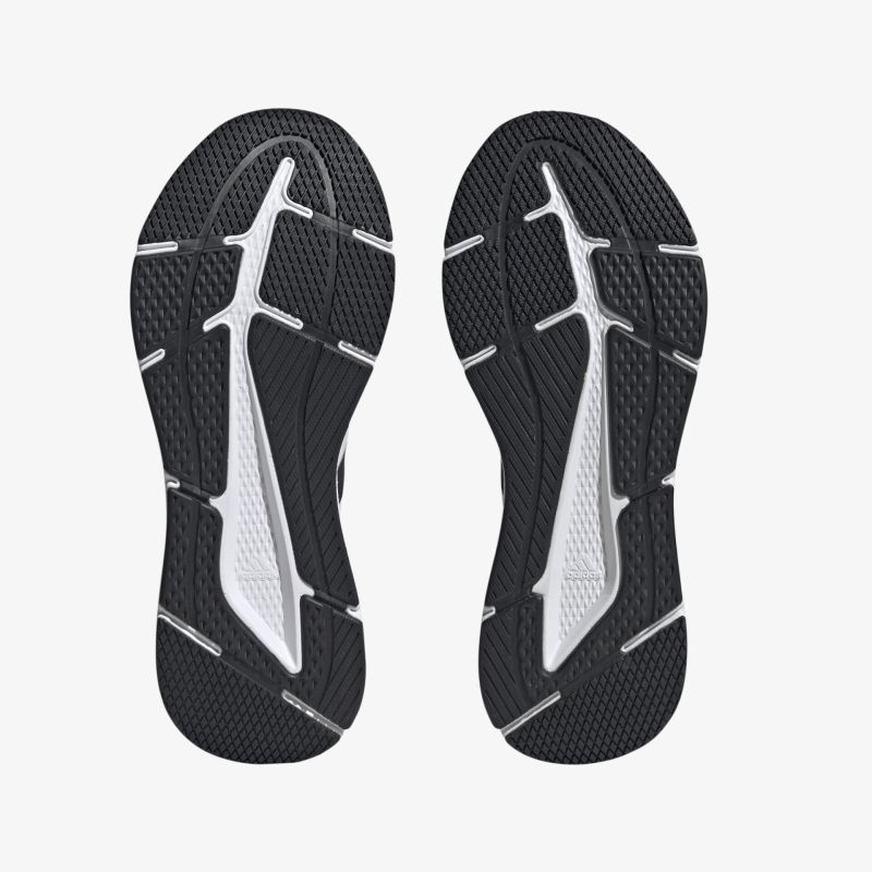 Schuhsohlen mit rutschfestem Profil und stoßdämpfender Technologie für optimalen Halt und Komfort beim Sport.