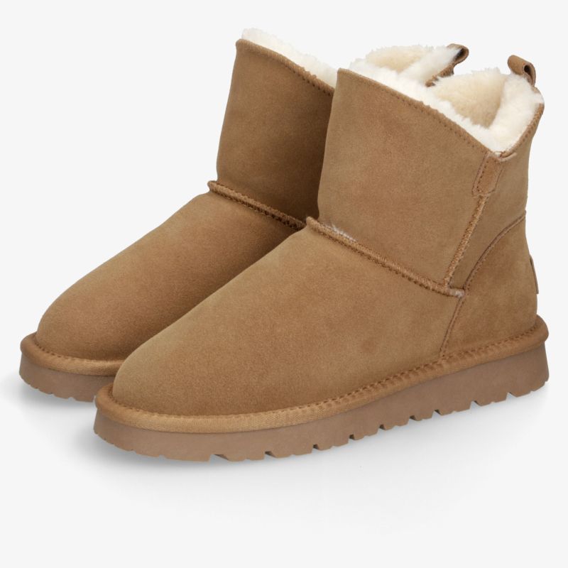 Komfortable knöchelhohe Stiefel mit weichem Plüschfutter und rutschfester Sohle für stilvolle Auftritte.