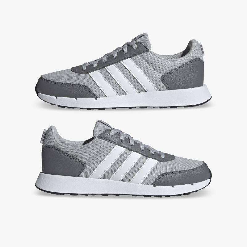 Sportlicher grauer Sneaker mit weißer Sohle, komfortabel und leicht, ideal für Freizeit und Bewegung