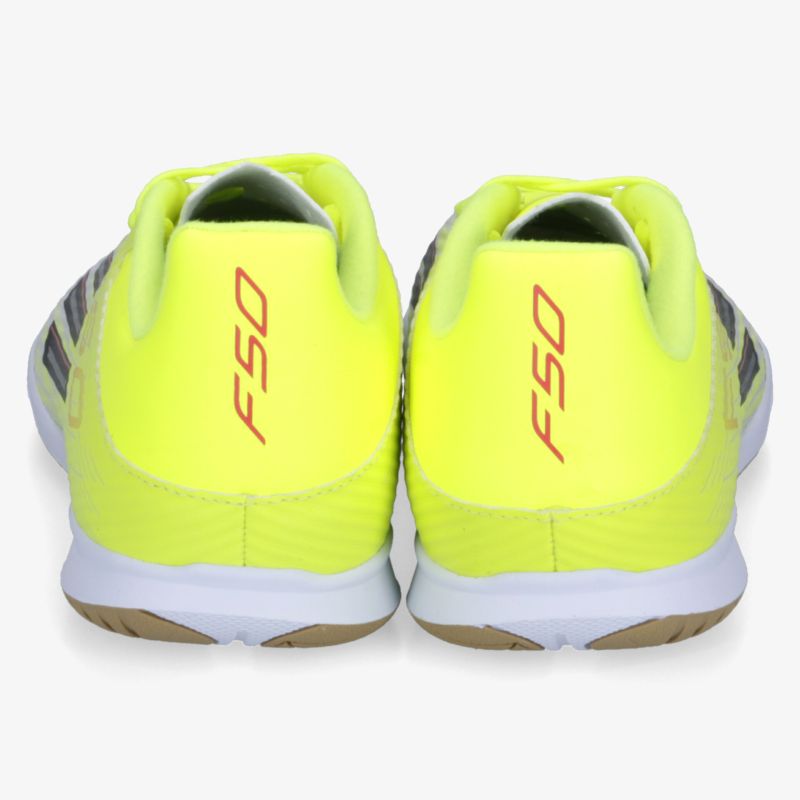 F50 Sportliche Schuhe in Neon-Gelb, Rückansicht, rutschfeste Sohle und stabiler Fersenbereich