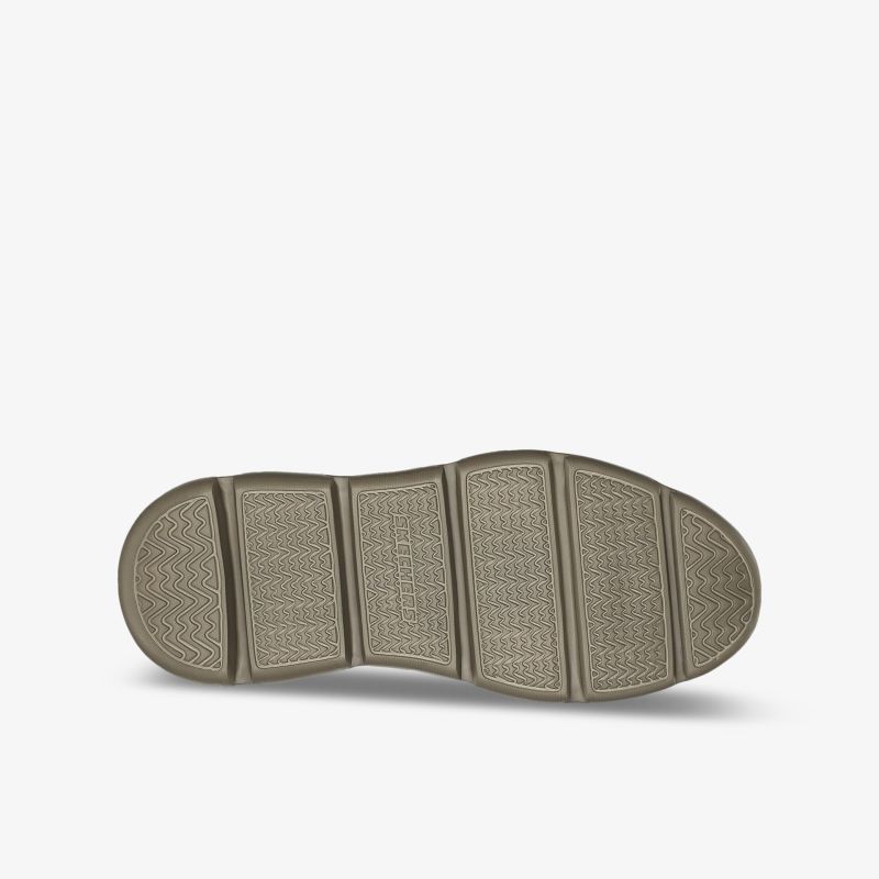 Robuste graue Schuhsohle mit rutschfestem Profil für sicheren Halt und optimalen Komfort