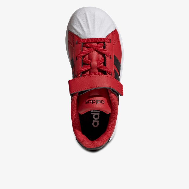 Sportlicher roter Sneaker mit weißer Kappe und praktischem Klettverschluss, bequem und atmungsaktiv