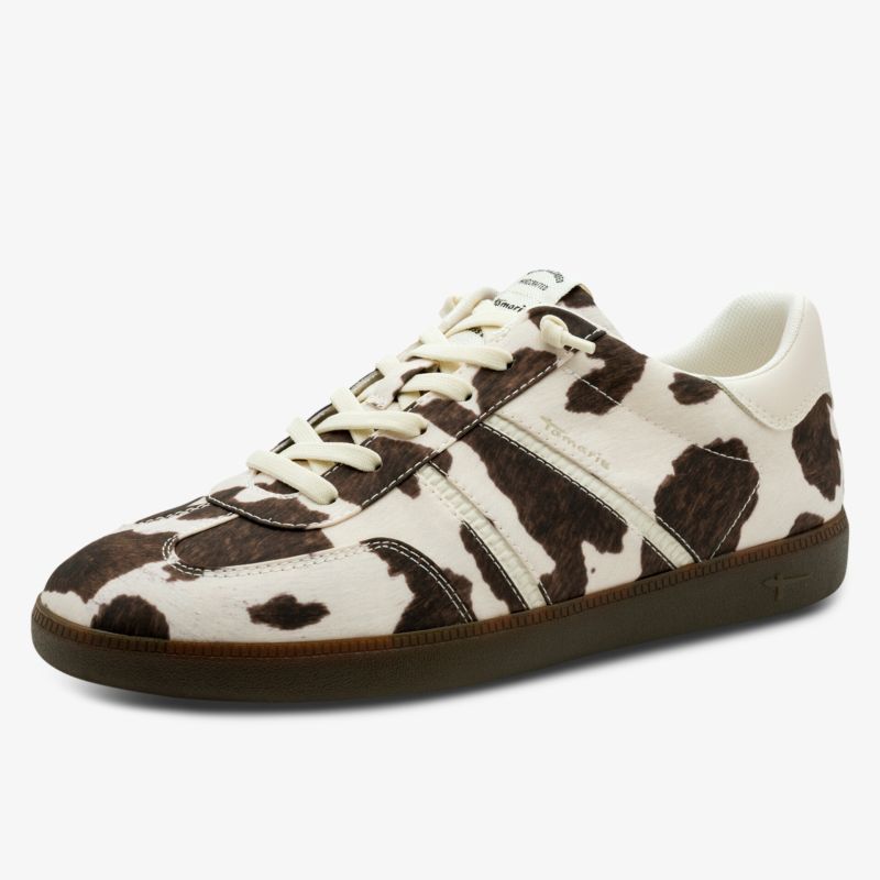 Bequemer Sneaker mit modischem Kuhfleckenmuster und robusten Sohlen für den Alltag und stilvolle Freizeit