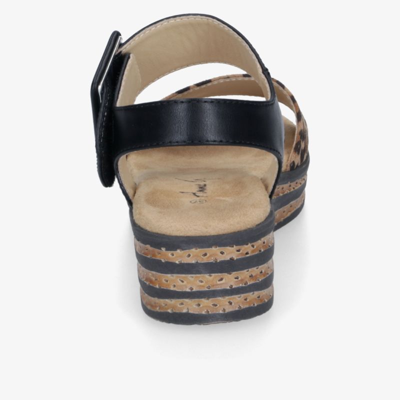 Stylische schwarze Keilsandalette mit bequemen Riemen und modernem Keilabsatz hinten abgebildet.