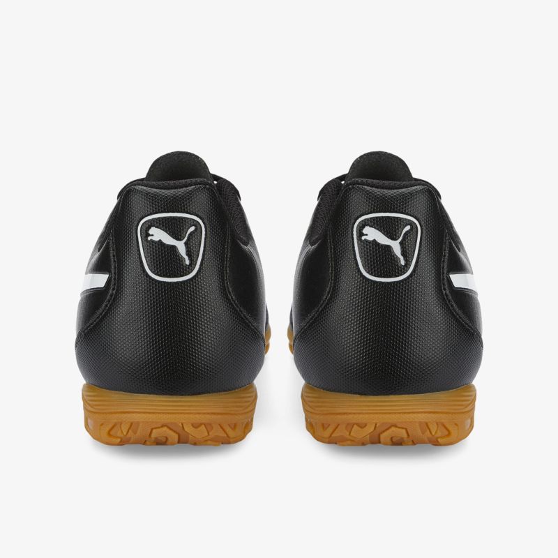 Robuste schwarze Fußballschuhe mit markanter Traktion und komfortabler Passform, ideal für dynamische Bewegungen.