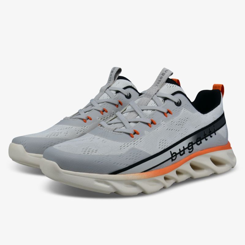 Moderner grauer Sneaker mit innovativer Sohle und sportlichem Design.