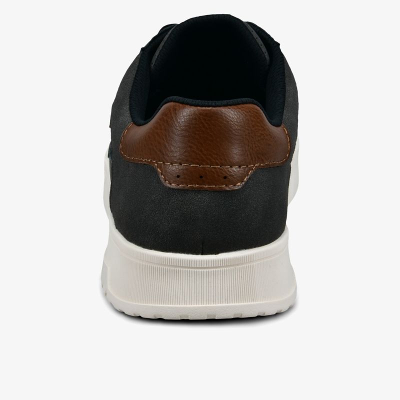 Moderner Schuh mit stabiler Ferse und rutschfester weißer Sohle in schwarzem und braunem Design