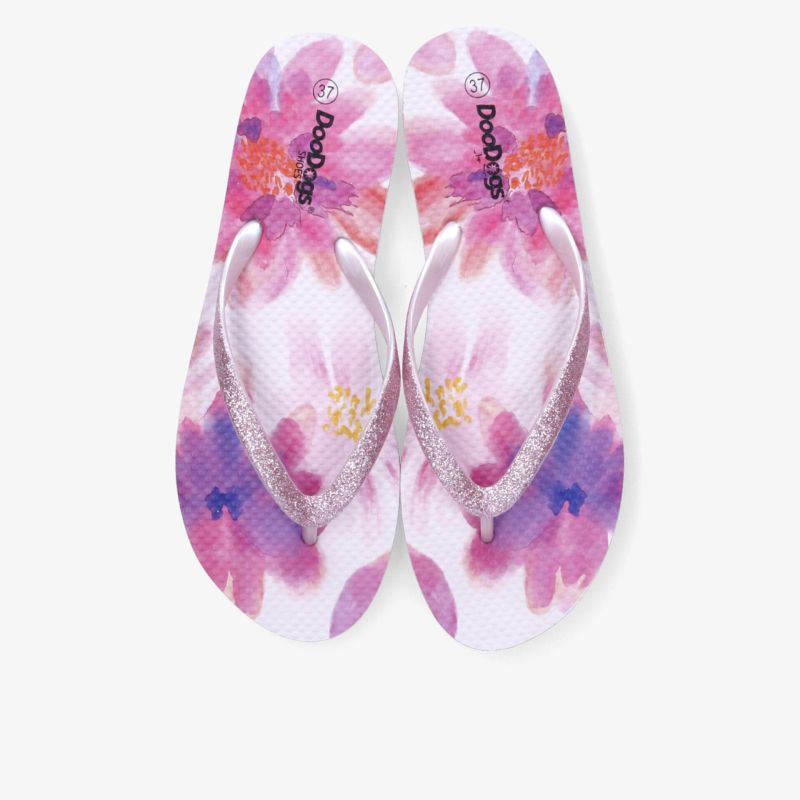 Leichte und bequeme Flipflops mit auffälligem pink-blumenmuster, rutschfeste Sohle und weichem Fußbett, ideal für Sommer