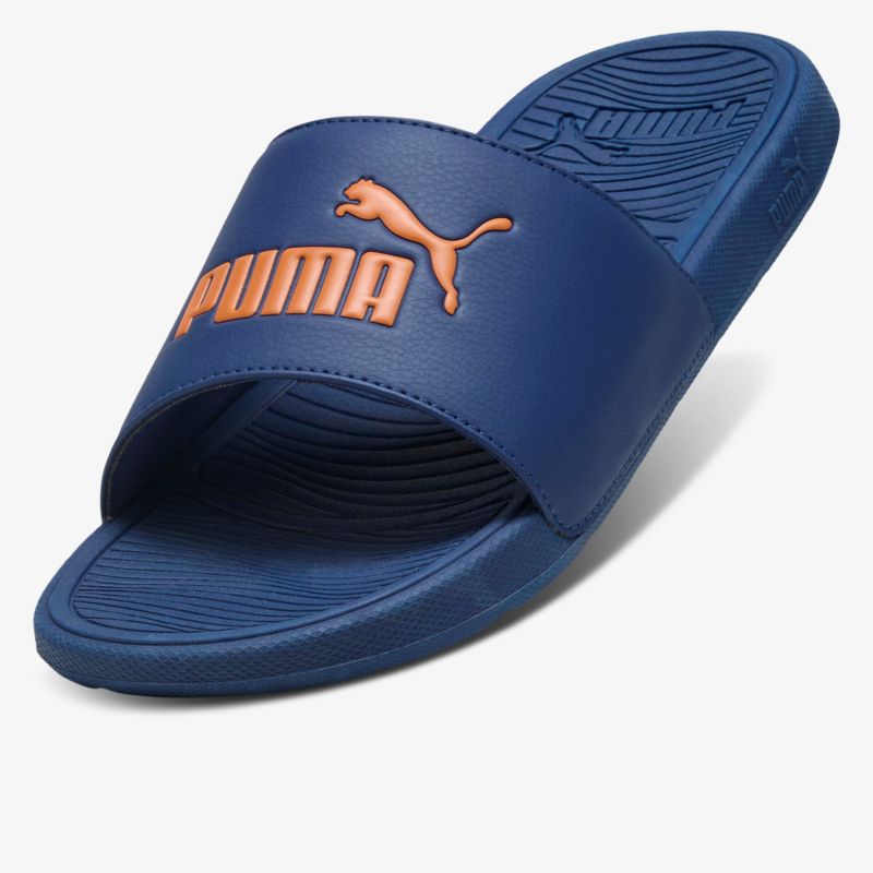 Blauer Puma Slide mit breitem Riemen und gepolsterter, rutschfester Sohle, ideal für Freizeit und Sport