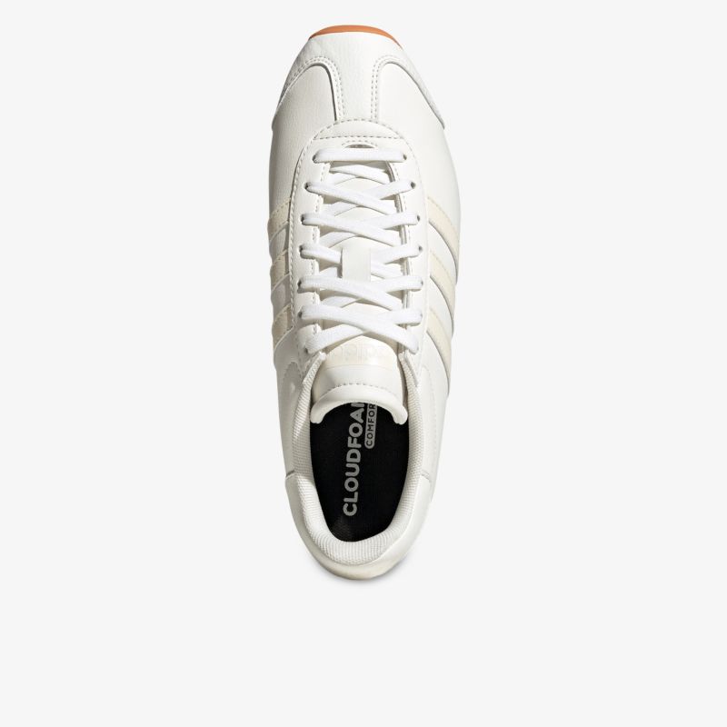 Weißer Sneaker mit bequemer Schnürung und minimalistischem, hochwertigem Design in Top-Down-Ansicht